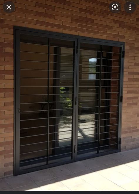 Burglar Proof Door Designs, Sliding Door With Grills, Window Security Bars Modern, Grills Design Window, Security Windows Ideas, Burglar Proof Window Designs, Wrought Iron Security Doors, Window Security Bars, Modern Window Grill