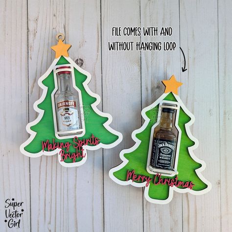 Christmas tree mini bottle holders. Compatible with small round and square bottles (last photo shows all the bottles I have tested and they fit). Enjoy 20% OFF New Release with discount Code: 20OFFNEW File link: https://www.supervectorgirl.com/products/christmas-tree-shooter-holder-svg-laser-cut-file-mini-alcohol-bottle-gift-small-round-or-square-booze-bottle-shot-shooters-alcohol-50-ml-shooters-mini-liquor-holder Happy to answer any questions. Made for 3mm (1/8 inch) thick material. Mini Alcohol Bottles Gifts, Mini Alcohol Bottles, Bottle Shoot, Liquor Gifts, Mini Bottle, Captain Morgan, Alcohol Bottles, Candy Holder, Bottle Gift