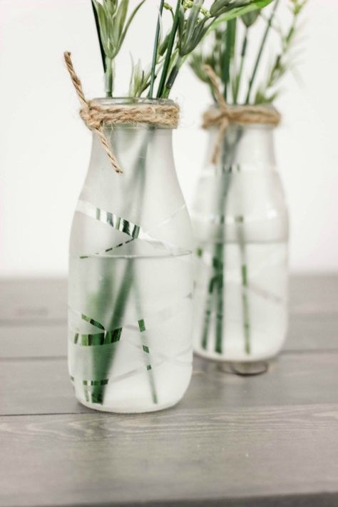 Upcycle some old milk bottles or glass containers into these beautiful and chic Glass Etched Vases! Starbucks Glass Bottle Crafts, Starbucks Bottle Crafts, Starbucks Glass Bottles, Milk Bottle Craft, Old Milk Bottles, Starbucks Bottles, Glass Bottle Diy, Diy Glass Bottle Crafts, Glass Milk Bottles