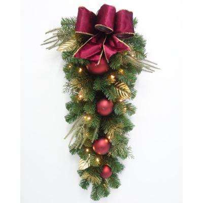 Tear Drop - Christmas Swag - Christmas Greenery - The Home Depot Exterior Christmas Decorations, Outdoor Christmas Wreaths, Christmas Door Hangings, Classic Holiday Decor, Mom Fit Jeans, Swag Ideas, Teardrop Swag, Christmas Swag, Christmas Greenery