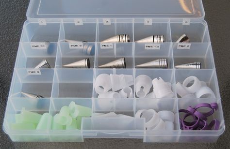 How I Like To Store My Icing Tips and Tips on the most often used tips so you don't waste $$ if you're a newbie. Baking Tools Organization, Cookie Room, Baking Supplies Storage, Baking Supplies Organization, Baking Organization, Cookie Tips, Baking Storage, Baking Station, Bakers Kitchen