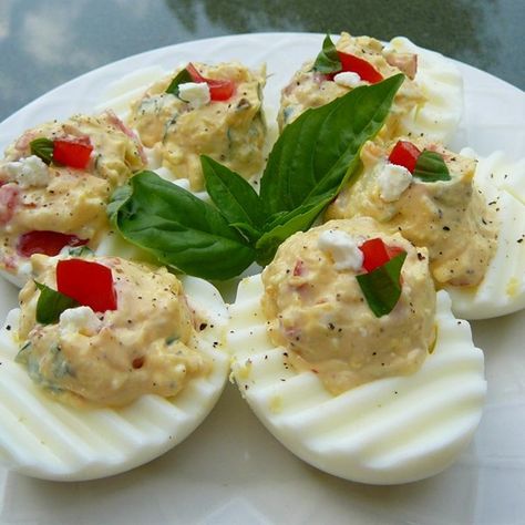 Greek Deviled Eggs | "My husband and I loved these deviled eggs. We are huge feta cheese people and I didn't measure the cheese, just added it." Healthy Deviled Eggs, Devilled Eggs Recipe Best, Devilled Eggs, Bacon Deviled Eggs, Greek Flavors, Egg Recipe, Cheese Snacks, Deviled Eggs Recipe, Eggs Recipe