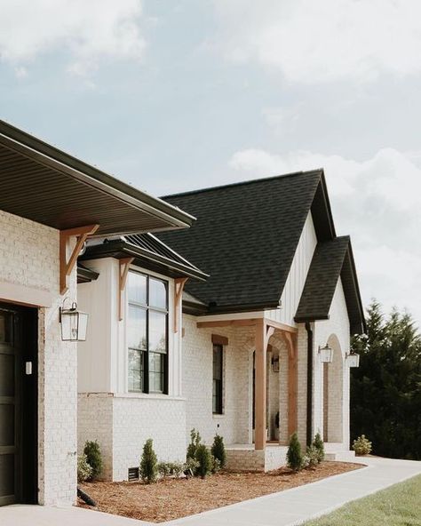 Exteriors Of Instagram on Instagram: "Swipe 👉 to see this home in all its beauty! Design/build by @stevenscustomhomes Project for @theblondehome Photos by @_chrissmithphotography_ #designbuild #customhomes #architecture #newconstruction #exteriordesign" White Siding Exterior, White Brick House Exterior, Brick Farmhouse Exterior, Bunker Home, Brick Farmhouse, Exterior Finishes, Farmhouse Remodel, Brick Exterior House, Modern Farmhouse Exterior