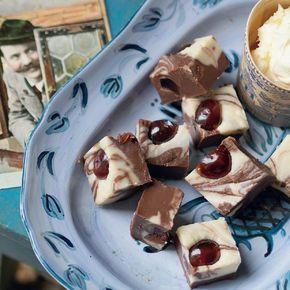 This sweet chocolate fudge recipe brings together the classic flavours of a black forest gateau. Think dark glace cherries, thick cream and double chocolate. Cooking Calamari, Bakewell Pudding, Chocolate Fudge Recipe, Black Forest Gateau, Natural Baking, Cherry Bakewell, British Desserts, Fudge Recipes Chocolate, Glace Cherries