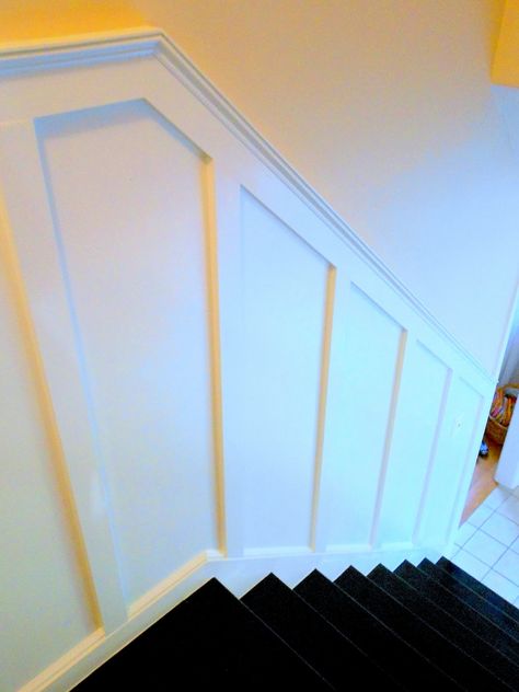 Board and Batten Wainscoting using Scrap Wood: Basement Stairway Black Board And Batten Staircase, Banister Lighting, Batton Walls, Board And Batten Stairwell, Stairway Banister, Wood Basement, Stairways Ideas, Board And Batten Wainscoting, Stairway Wainscoting