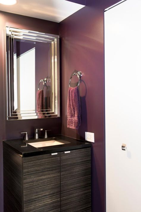 Deep plum walls add drama to this powder room. Description from photos.hgtv.com. I searched for this on bing.com/images Purple Bathroom Paint, Dark Purple Bathroom, Plum Bathroom, Lavender Bathroom, Purple Bathroom Decor, Purple Bathroom, Bold Bathroom, Compact Vanity, Gray Bathroom Decor