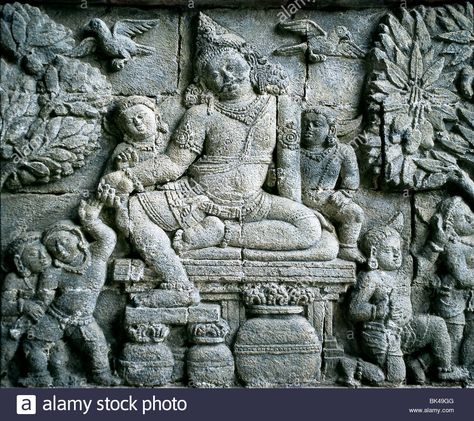 Chandi Mendut (Candi Mendut) Java Indonesia bas relief: Kuvera on north wall of an antechamber Kuvera is God of Wealth Stock Photo Candi Mendut, God Of Wealth, Art Program, Southeast Asian Arts, Brown Wallpaper, Bas Relief, East Asian, Art Programs, Southeast Asian