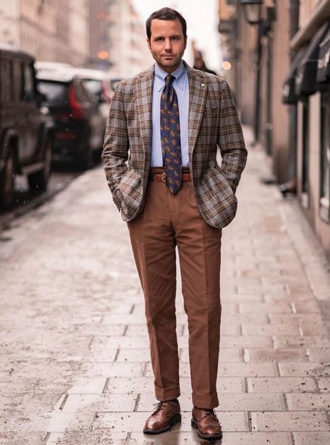 Craft a distinguished look with a brown plaid blazer paired with a blue shirt and navy tie, perfectly rounded off with coordinating brown pants and brogue Derby shoes. A refined ensemble for the modern gentleman. Blue Plaid Pants Outfit, Brown Plaid Blazer, Blue Plaid Pants, Brown Pants Outfit, Plaid Pants Outfit, Brown Derby, Pants Outfit Men, Brown Dress Pants, Navy Tie