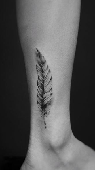 Dove And Feather Tattoo, Rib Feather Tattoos For Women, Seagull Feather Tattoo, Pigeon Feather Tattoo, Bicep Feather Tattoo, Feather Tattoos Western, Feather Tattoo Ideas For Women Shoulder, Black And White Feather Tattoo, Cross And Feather Tattoo