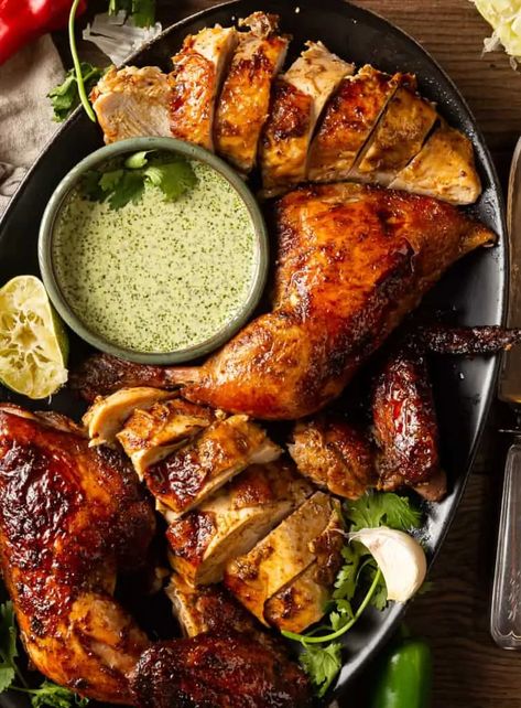 Peruvian chicken recipe Roasted Peruvian Chicken, Peruvian Chicken Recipe, Yucca Fries, Corn Tomato Salad, Peruvian Chicken, Peruvian Recipes, Green Sauce, Sauce For Chicken, Grilled Corn