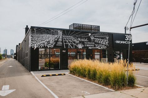 This former auto body shop is part of Etobicoke's facelift Exposed Beams Ceiling, Exterior Murals, Shop Exterior, Wellness Room, Polaroid Wall, Toronto City, Auto Body Shop, City Planning, Cement Floor