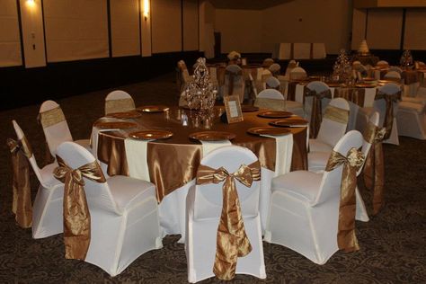 Gold Table Runners and Gold Crinkle Sashes with White Table Linens and White Chair Covers White Table Cloth With Gold Runner, White Chair Covers With Gold Sash, Chair Covers Wedding Reception, Gold Chair Covers, Engagement Planning, Gold Runner, White Chair Covers, Gold Tablecloth, Gold Table Runners