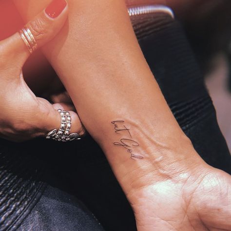 Carla R. on Instagram: “Great meaning behind these words. . . . .  #circatattoo #finelinetattoo #finelines #dainty #instagood  #west4tattoo #tinytattoo #butGod” Cute And Dainty Tattoos, Dainty Faith Based Tattoos, Meaningful Dainty Tattoos, Delicate Word Tattoo, Meaningful Fine Line Tattoos, Dainty Meaningful Tattoos, Unique Dainty Tattoos, Simple Meaningful Tattoos For Women, Cute Dainty Tattoos