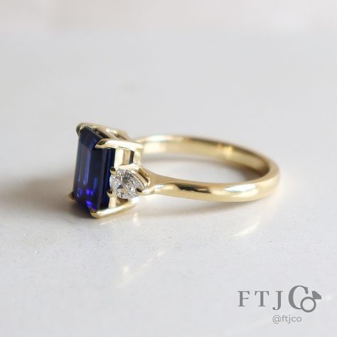 Excuse me, did somebody order a blue sapphire engagement ring? 👀 While sapphires are naturally found in almost every colour, for many folks, the word 'sapphire' evokes this exact shade of rich, deep blue. This is the type of sapphire that was most highly prized in centuries past! Today, we can create this same colour in the lab, and in fact, this very ring features a lab grown sapphire. 💁💍💙 . This is an Emilia Three Stone Ring made in our 18K AKARA People + Planet yellow gold. It's set with ... Deep Blue Engagement Ring, Vintage Sapphire Engagement Rings, Blue Sapphire Engagement Ring, Ring Inspiration, Vintage Engagement Rings Sapphire, Blue Engagement Ring, Engagement Ring Inspiration, Vintage Sapphire, Sapphire Engagement Ring Blue