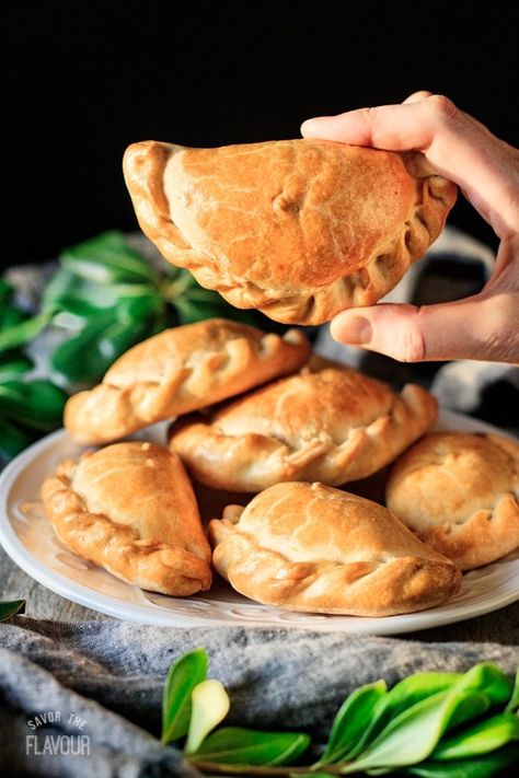 Argentinian-Style Baked Chicken Empanadas: this easy recipe for baked chicken empanadas will show you how to make savory hand pies that the whole family will love. Your kids will enjoy this delicious South American comfort food at lunch or dinner. | www.savortheflavour.com #savortheflavour #empanadas #argentina #chicken #handpies Baked Chicken Empanadas, Savory Hand Pies, Recipe For Baked Chicken, American Comfort Food, Hand Pies Savory, Chicken Empanadas, Savory Pies Recipes, South American Recipes, Appetizers For A Crowd