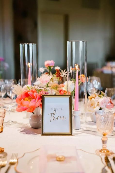 Skip the single, large wedding centerpiece on each wedding reception table and opt for bud vases that create mini arrangements across the table. Take notes from this boho summer wedding and pair bold-colored mini florals with pink taper candles, colored glassware, and gold table décor. Click the link for more stunning wedding flowers. // Photo: Jodee Debes Photography Mini Arrangements, Taper Candle Centerpiece, Pink Taper Candles, Taper Candles Wedding, Tall Floral Arrangements, Summer Centerpieces, Unique Flower Arrangements, Unique Wedding Flowers, Wedding Vases