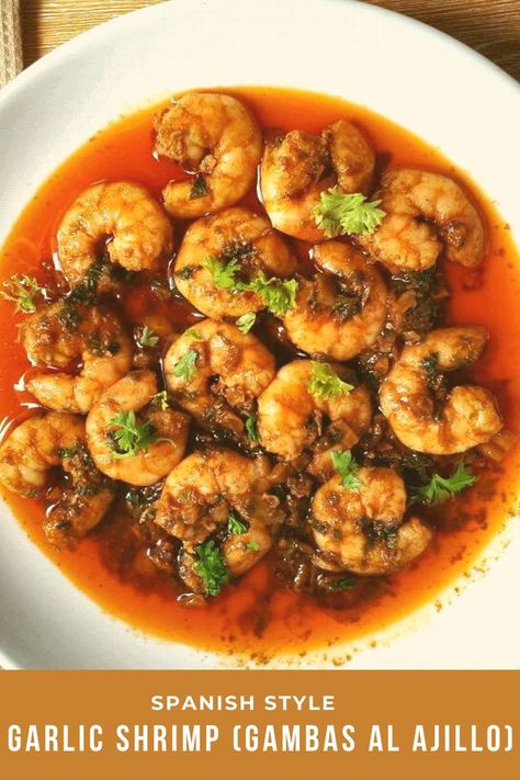 Spanish Style Garlic Shrimp, also known as Gambas Al Ajillo, is a spanish tapa dish that is mixed with olive oil, garlic, paprika and shrimp/prawn. It is garnished with parsley and drizzle with lemon. #gambasalajillo #spanishgarlicshrimp #shrimptapas Shrimp Gambas Recipe, Spanish Style Landscaping, Gambas Recipe, Spanish Style Homes Interior, Shrimp Gambas, Shrimp In Garlic Sauce, Prawn Dishes, Garlic Prawns, Olive Oil Garlic