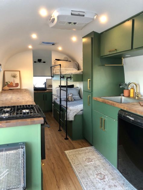 Airstream bunk beds bar stools vintage trailer interior royal orchard Behr renovation Narrowboat Bunk Beds, Airstream Bunk Bed Ideas, Airstream Bunk Beds, Skoolie Bunk Beds, Tiny House Bunk Beds, Caravan Bunk Beds, Camper Bunk Beds, Airstream Bathroom, Airstream Decor