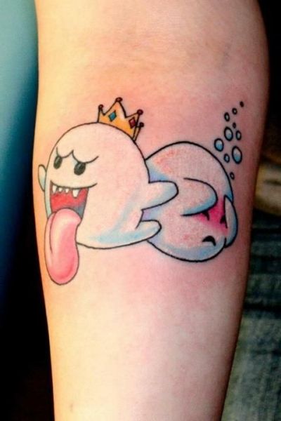 Video games have been extremely popular for years now. It is only fitting that gamer tattoos for men have become a popular choice. There are some things to consider when deciding on a video game… Super Mario Tattoo, Games Tattoo, Nintendo Tattoo, Video Game Tattoos, Mario Tattoo, Gamer Tattoos, Video Game Tattoo, Ghost Tattoo, Geek Tattoo