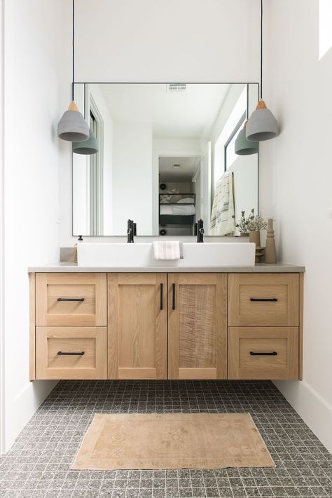 concrete bathroom, concrete pendants, bathroom lighting, neutral bathroom, bathroom ideas, bathroom inspiration Floating Vanity Bathroom, Organic Bathroom, Concrete Pendant Light, Concrete Pendant, Floating Cabinets, Becki Owens, Bathroom Design Trends, Floating Bathroom Vanity, Unique Tile