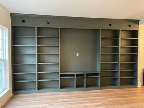 Green Ikea Billy bookcase in living room before filling with books. Billy Book Case Tv, Ikea Hack Built In Bookcase With Tv, Ikea Built In Billy Bookcase, Ikea Built In Library Hack, Billy Bookcase Around Tv, Ikea Tv Unit Hack Billy Bookcases, Ikea Bookcase Built In Hack, Ikea Bookcase Tv Wall, Shelving For Living Room