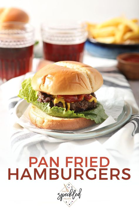 Want a burger but can’t fire up the grill? These Skillet Hamburgers, cooked on the stovetop, make the perfect dinner, no matter the time of year! Learn how easy it is to pan fry hamburgers. #EasyEntertaining #SpeckledPalate Best Pan Fried Burgers, Pan Hamburgers, Pan Fried Burgers, Fried Hamburger Patties, Skillet Hamburgers, Pan Fried Hamburgers, The Best Hamburgers, Best Hamburger Patty Recipe, Best Hamburgers