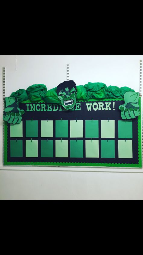 Incredible Hulk themed bulletin board to display student work The paper is stapled at each corner and the paper clip is just clipped at the top of the page, making it easy to change student worksheets Bulletin Board To Display Work, Student Work Display Ideas Hallways, Marvel Classroom Theme, Wow Work Display, Marvel Classroom, Student Work Wall, Student Work Bulletin Board, Display Student Work, Superhero Classroom Decorations