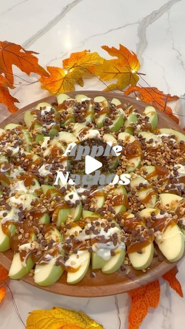 Linda | Make Life Extra | Fun Recipes + Home Finds + DIY on Instagram: "Apple nachos are the perfect dessert for all of your fall gatherings. 🍏🍎 Slice your apples. You can soak them in cold water with a tablespoon of salt to keep them from browning.  Arrange apple slices on a platter. Top with melted caramel, melted white chocolate, mini chocolate chips and nuts. The possibilities are endless so add your favorites. Enjoy!   #caramelapples #applenachos #appleseason #falldesserts #candyapples" Candy Apple Nachos, Fall Apple Nachos, Caramel Apple Platter, Fall Charcuterie Board Dessert, Apple Slices Snack, October Dessert Ideas, Fun Fruit Ideas For Kids, Fall Fruit Platter Ideas, Refreshments Ideas Snacks