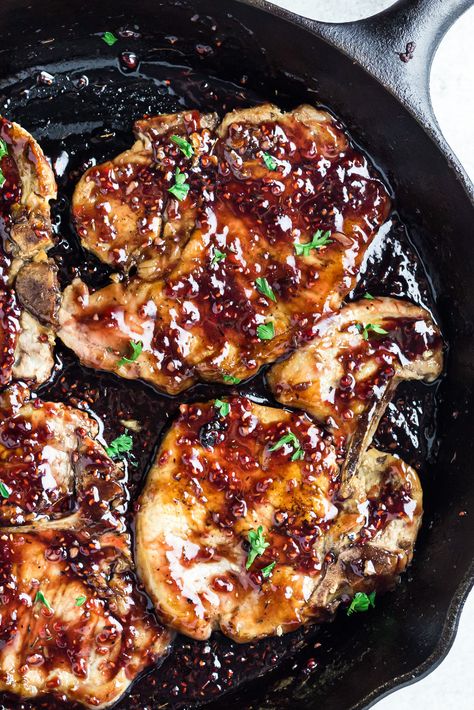 Make these Raspberry Balsamic Glazed Pork Chops for an easy flavorful dinner. Pan fried bone-in pork chops with a raspberry balsamic glaze. Glazed Boneless Pork Chops, Balsamic Glaze Dinner, Raspberry Glazed Pork Chops, Cherry Balsamic Pork Chops, Raspberry Pork Chops, Balsamic Glaze Pork Chops, Raspberry Balsamic Pork Chops, Blackberry Pork Chops, Balsamic Glazed Pork Chops