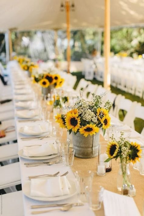 #TrendAlert - Here's how you can include sunflowers at your wedding.Be it sunflower wedding decor or sunflower themed wedding invite, check out unique ways at weddingbazaar.com. #weddingbazaar #indianwedding #sunflowerweddingdecorrustic #sunflowerweddingdecordiy #sunflowerweddingdecorsimple #sunflowerweddingdecorboho #sunflowerweddingdecorreceptions #sunflowerweddingdecorweddingtable #sunflowerweddingdecorweddingceremonydecor #sunflowerlehenga #sunflowerweddinginvitation #sunflowerseeds