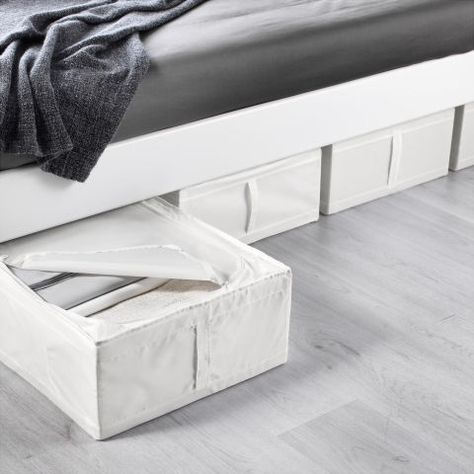 Functional storage shouldn't just be focused on items that are in use. Your out-of-season clothes are just as important, which is why we're big fans of this under-bed organizer ($5, ikea.com). Pro tip: Use it for extra bed linens or towels too. Ikea Skubb, Under Bed Organization, Bed Organiser, Ikea Organization, Best Ikea, Ikea Storage, Linen Storage, Ikea Family, Linen Color