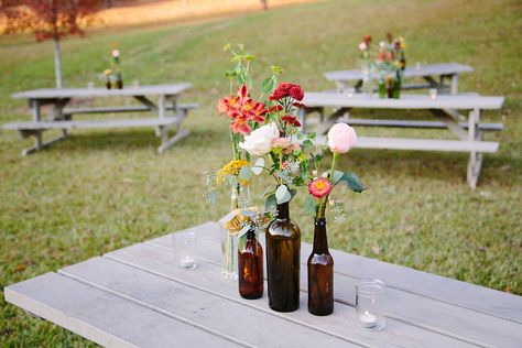 summer-flowers-wine-bottles-wedding-centerpiece - Home Decorating Trends - Homedit Party Decorations Simple, Beer Bottle Centerpieces, Wine Centerpiece, Glass Bottles Wedding, Wine Bottle Wedding Centerpieces, Wine Bottle Centerpieces, Rustic Wedding Backdrops, Flowers Wine, Wedding Wine Bottles