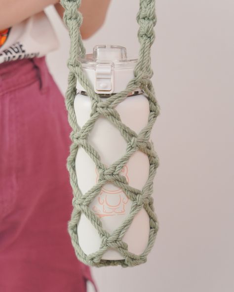 Join our growing community of macrame enthusiasts! Our wall hanging kit is a great way to connect with others who share your passion for DIY. 💐 Check out more at https://beandaikon.etsy.com/listing/1484751612 or contact us directly! #HandmadeWithLove #DIY #MacrameCrafts #artisanmade #macramedecor #bohemiandecor #artisanalpresents #homestyling #supportlocalmakers #bohostyle #homedecorideas #bohoinspo #MacrameBeginnner #BirthdayGift #BottleHolder #MakeItYourself #handcraftedmacrame #MakeYourO... Macrame Wine Glass Holder, Macrame Water Bottle Holder Diy, Macrame Water Bottle Holder, Macrame Bottle Holder, Macrame Water Bottle, Boho Inspo, Macrame Hanger, Wine Glass Holder, Lace Jewelry