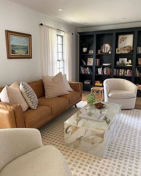 Article on Instagram: "The only thing better than a Timber Charme Tan Leather Sofa is one sandwiched between two Turoy Chairs. Tap the link in bio to shop. Photo by @themabelhouse #OurArticle #TimberSofa #TuroyChair #LivingRoom #LivingRoomDesign #LivingRoomIdeas" Leather Sofa Living Room Ideas, Tan Leather Sofa Living Room, Tan Sofa Living Room, Tan Leather Sectional, Caramel Leather Sofa, Leather Sofa Living, Tan Sofa, Tan Leather Sofas, Leather Couches Living Room