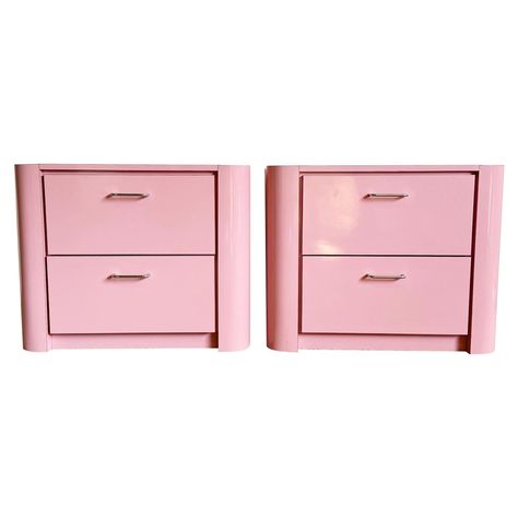 Add a splash of modernity to your bedroom with these Postmodern Pink Lacquer Laminate Nightstands with Chrome Handles. The bold pink hue and sleek chrome handles create a striking contrast, offering a playful yet sophisticated look. Equipped with drawers for storage, these nightstands combine practicality with contemporary style, perfect for those who love vibrant and functional bedroom furniture. Vintage pieces may have age-related wear. Review photos carefully, ask questions, request more imag Pink Nightstands, Card Game Table, Tea Cup Art, Hanging Floor Lamp, Bar Dining Table, Bedside Storage, Nightstand Storage, Set Decor, Modern Bedroom Decor