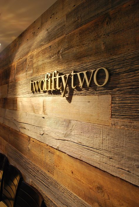 letters on reclaimed wood: The similar colors really help the sign display fit into it's surroundings. Office Signage, Interior Logo, Logo Wall, Wayfinding Signage, Sign Display, Environmental Design, 3d Logo, Environmental Graphics, Signage Design