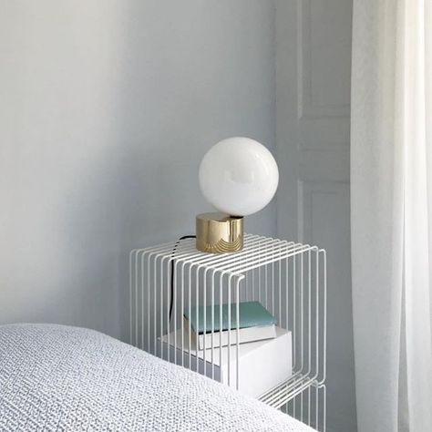 A beauty of a bedroom that exudes airy lightness and tranquility. Panton Wire bedside table in the home of @michael_nygaard #pantonwire #bedsidetable #nightstand #bedroominterior #bedroomdecor #soveværelse #soverom Wire Bedside Table, Montana Furniture, Farmhouse Chandeliers, Wire Shelf, Swag Light, Task Floor Lamp, The Tongue, Led Desk Lamp, Wire Shelving