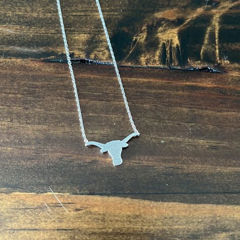 New Texas Longhorns Necklace In A Silver Color. An Awesome Way To Show Your Longhorn Pride! Cheap Silver Western Necklaces, Longhorn Belly Ring, Rodeo Necklace, Long Horn Earrings, Longhorn Necklace, Must Have Jewelry, Mrs Necklace, Om Necklace, Sun And Moon Necklace