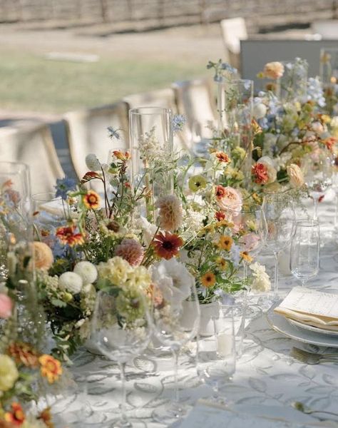 Midsummer Dream Wedding, May Wedding Decor Ideas, Spring Wedding Table Florals, Table Setting Long Table, Early May Wedding, Spring Garden Wedding Tablescape, Wedding Reception One Big Table, Wildflower Long Table Wedding, Flower Decorations Wedding Table