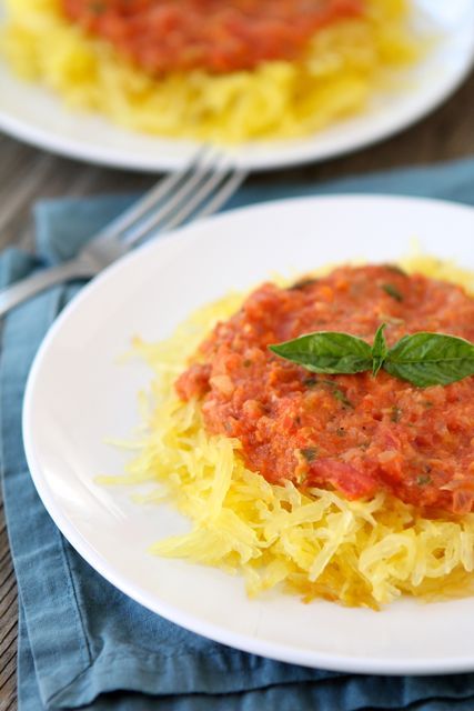 Baked Spaghetti Squash with Creamy Roasted Red Pepper Sauce on twopeasandtheirpod.com My favorite spaghetti squash recipe! Best Spaghetti Squash, Roasted Red Pepper Sauce Recipe, Creamy Roasted Red Pepper Sauce, Red Pepper Sauce Recipe, Saucy Pasta, Spaghetti Squash Recipes Healthy, Recipes Spaghetti, Roasted Red Pepper Sauce, Baked Spaghetti Squash