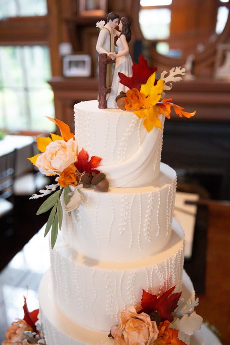 Our wedding cake by Zingermans Bakery - Ann Arbor Michigan. Fondant design was created to match my dress and the fall flowers and leaves were so amazing. #michiganwedding #fallthemewedding #zingermansbakery #weddingcake #wellerscarriagehouse Fall Wedding Cake Designs, Fall Theme Wedding Cake, Rustic Fall Wedding Cake, Fall Theme Wedding, Fall Themed Wedding Cakes, Autumn Wedding Cake, Unique Fall Wedding, Orange Wedding Cake, Cake Fall