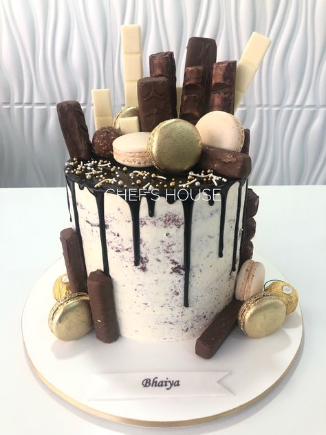 #DripCake . . . . . . . . . Follow us on Instagram: https://www.instagram.com/chefshousebd #ChefsHouse #chocolatecake #onlinecookingclass #newnormal #quarantinecooking #DripCake #MacaronDripCake #MirrorGlazeCake #WeddingCake #AnniversaryCake #BirthdayCake #FloralCake #FondantCake #ThemeCake #ButterCreamCake #BabyShowerCake #MiniCake #BridalShowerCake #Macarons #Dessert #CookingClass #CakeMakingClass #CakeDecoratingClass #Desserts #chefshousebd Macaroon Decorated Cake, Birthday Cake With Macarons On Top, Macaron Drip Cake, Drip Cake With Macarons On Top, Chocolate Cake With Caramel Drip, Online Cooking Classes, Mirror Glaze Cake, Macaron Cake, Cake Decorating Classes