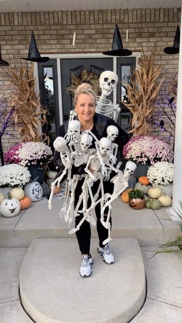 Trina Hopkins 🎉 Mom Blogger on Instagram: "Put a little spook in our front porch! 💀 Climbing skeletons, lighted trees, flying witch hats, floating candles and more! We are so excited to celebrate Halloween 🎃 Some of our favorite finds for the front porch include the purple trees with crows, flame porch lights, mini skeletons, and floating candles with witch hats. All will be linked in stories. #fallporch #fallfrontporch #halloweenporch #halloweenfrontporch #spookyseason #skeletondecor #ske Climbing Skeletons, Blue Themed Food, Front Porch Halloween Decor, Porch Halloween Decor, Halloween Porch Lights, Floating Candles Halloween, Front Porch Halloween, Halloween Decor Outdoor, Lighted Trees