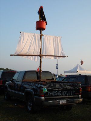 Jimmy Buffett Tailgate Rigs Jimmy Buffet Tailgate Ideas, Margaritaville Halloween, Jimmy Buffett Tailgate, Parrothead Party, Buffett Ideas, Jimmy Buffett Party, American Neighborhood, Jimmy Buffett Quotes, Jimmy Buffett Concert