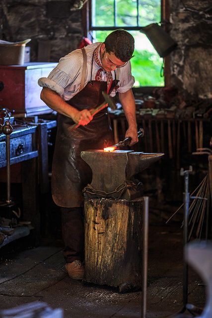 Blacksmith Costume, Village Blacksmith, Sturbridge Village, Blacksmith Forge, Blacksmith Tools, Corporate Portrait, Blacksmith Shop, Art Of Manliness, Greek Gods And Goddesses