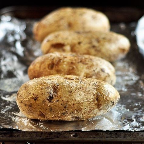 Perfection --> How To Bake a Potato in the Oven Cooking Lessons from The Kitchn Baked Potatoes In The Oven, Potatoes In The Oven, Perfect Baked Potato, A Potato, Cooking Lessons, Baked Potatoes, Oven Cooking, Potato Dishes, It Goes On