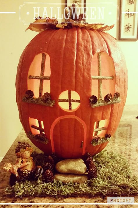 Fairy House Pumpkin Carving Ideas, House Carved Pumpkin, Pumpkin Carved House, Hobbit House Pumpkin Carving, Fairytale Halloween Decor, Pumpkin House Carving Ideas, Pumpkin Fairy House Carving, Pumpkin Houses Carving, Cottage Pumpkin Carving