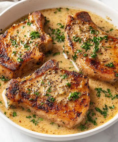 Garlic Parmesan Pork Chops Recipe - elianarecipes.com Rib Chops Recipe Pork, Quick Marinade For Pork Chops, Amazing Pork Chop Recipes, Light Pork Chop Recipes, Thinly Sliced Pork Loin Recipes, Thick Pork Loin Chops Recipes Boneless, Garlic Parm Pork Chops, Creamy Lemon Pork Chops, Pork Sirloin Chops Recipes