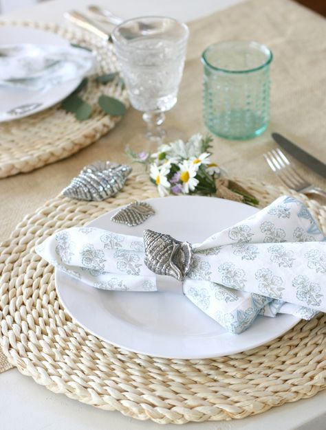 JUST IN: New Coastal Styles! #arthurcourtdesigns #arthurcourt #seaandshorecollection Shell Napkin Rings, Summer Tables, Spiral Pattern, Aluminum Table, Ocean Theme, Beach Lifestyle, Ocean Themes, Nautical Theme, Sea Shell