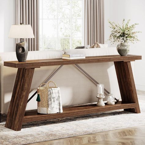 This rustic brown sofa table enhances any decor and showcases your treasured items with ample two-tier storage. With a narrow, elongated design, this table is a versatile addition, perfect as a sofa table, entryway console, or TV stand. Constructed from high-quality MDF and robust metal, it ensures long-lasting durabil Couch With Console Table Behind, Console Table Styling Behind Couch, Long Sofa Table Behind Couch, Behind The Couch Console Table, Console Table Behind Sofa, Sofa Table Behind Couch, Entrance Console Table, Industrial Sofa Table, Farmhouse Entryway Table